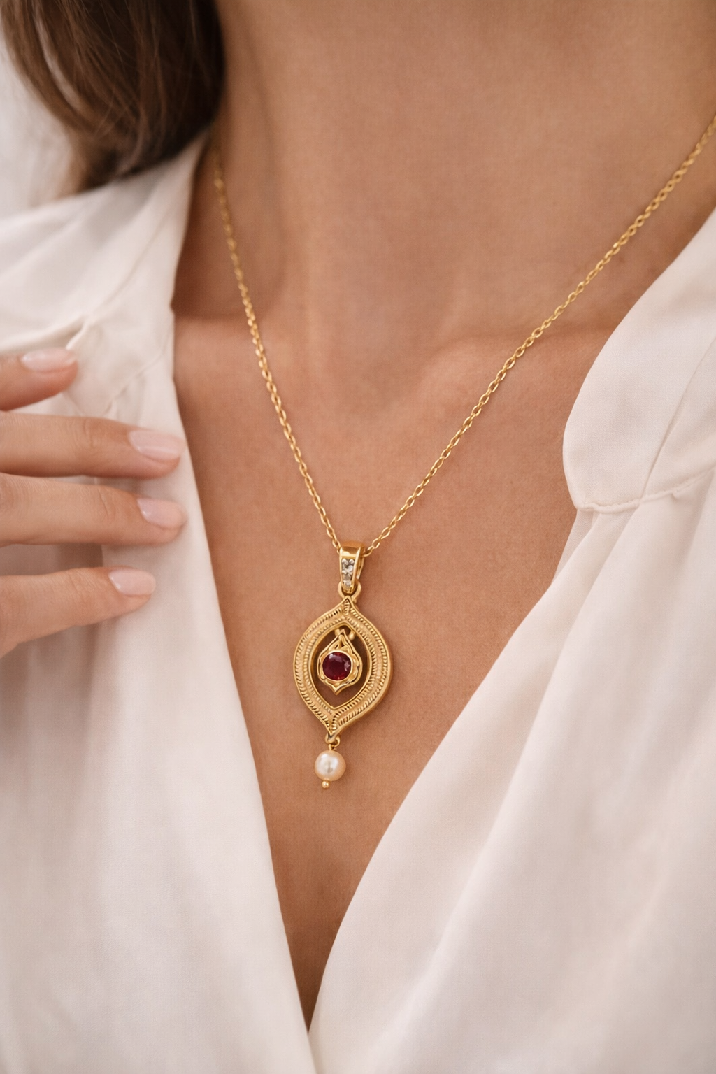 Woman wearing The Vianny Signature Necklace in gold, a meaningful empowerment necklace designed for self-care and confidence
